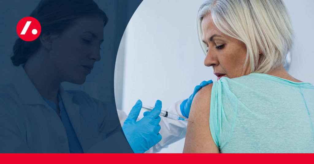woman receiving a vaccine, vaccination status