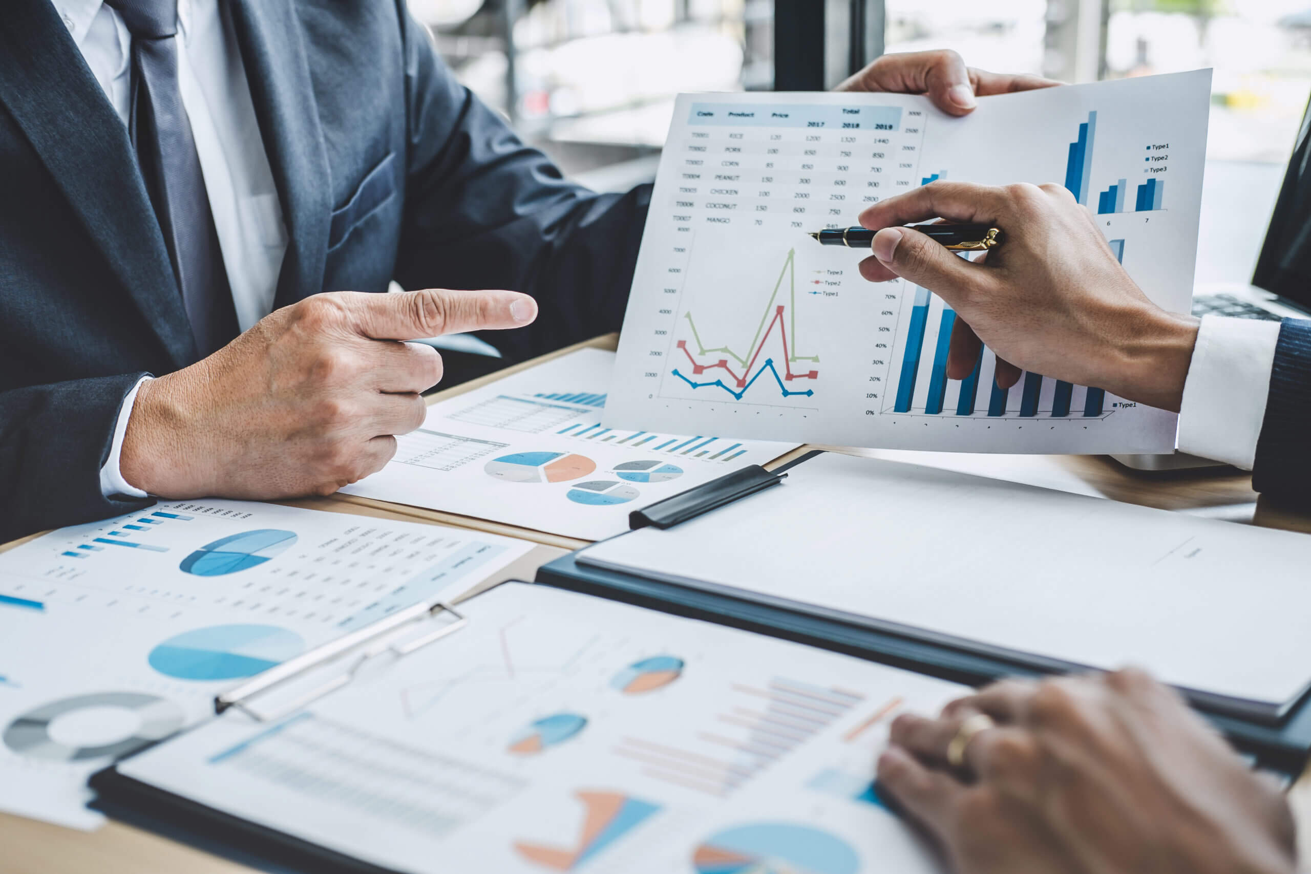 Two executive discussing company growth project success financia