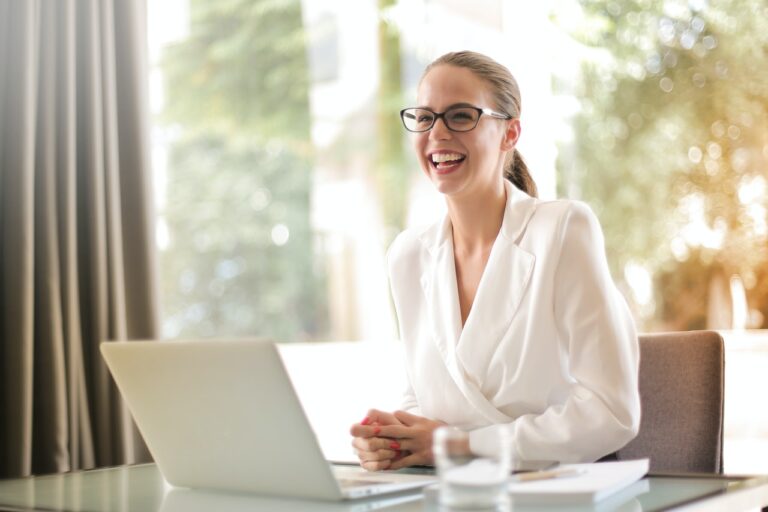 Happy woman with laptop